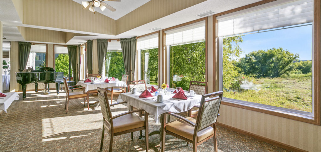 Cornerstone's dining room with many tables set for a meal